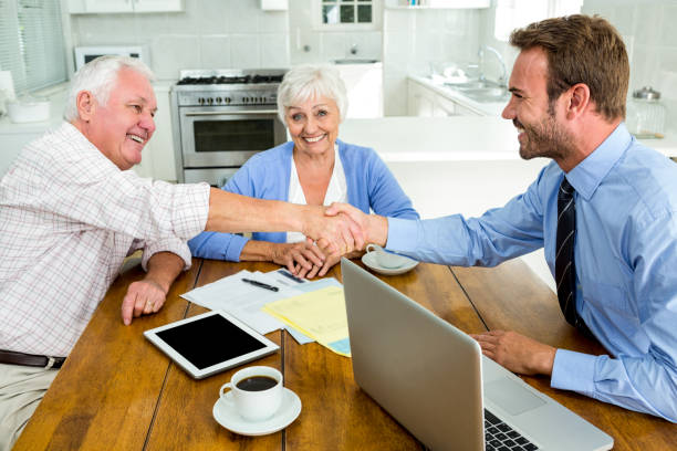 Seth McMullen meeting with senior clients at their home